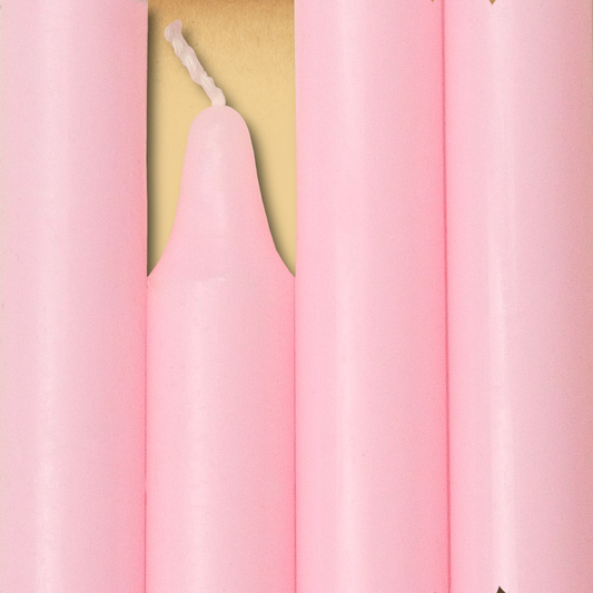 Closeup of a quartet of Pink Chime Candles arranged side-by-side so they form an almost solid block of color.