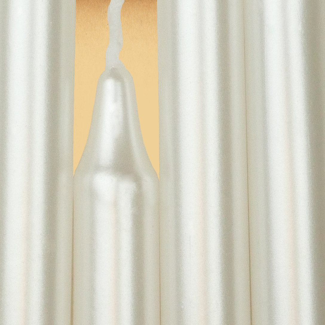 Closeup of a quartet of Pearl White Chime Candles arranged side-by-side so they form an almost solid block of color.