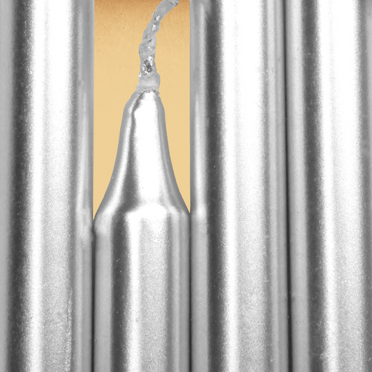 Closeup of a quartet of Silver Chime Candles arranged side-by-side so they form an almost solid block of color.