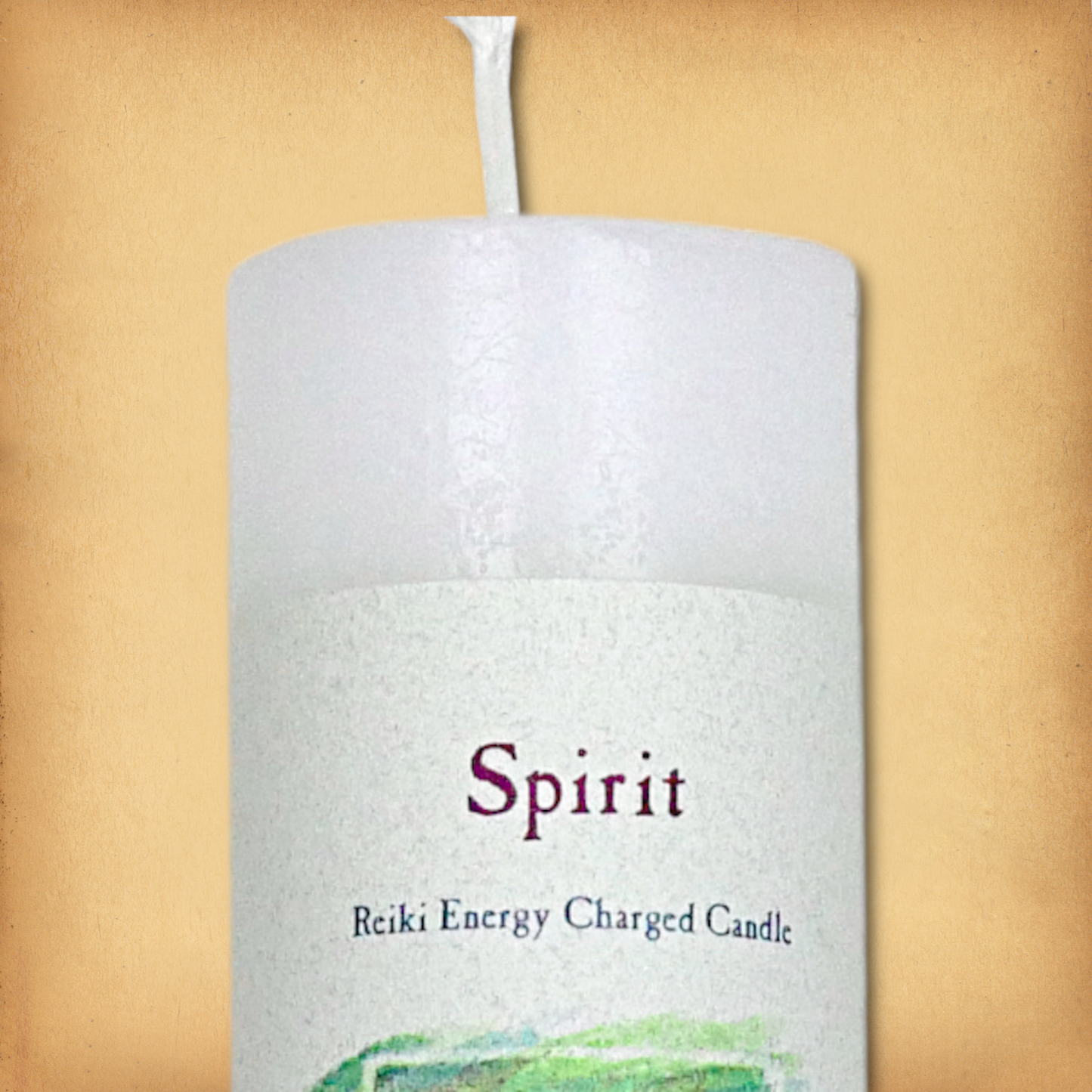 White pillar candle labeled “Spirit” with “Reiki Energy Charged Candle” beneath. Slim pillar candle with a single wick.