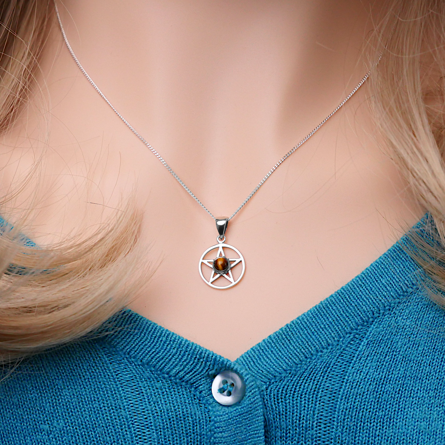 Sterling Silver Pentacle Pendant w/ Tiger Eye, worn by a model, featuring a pentacle star, ideal for witches and pagans.