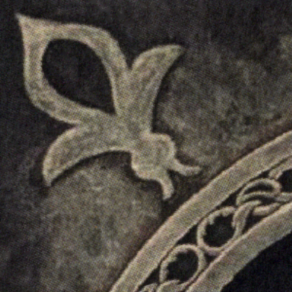 Close-up of The Talisman Cross Stitch Pattern featuring carved stone details that are part of the gothic window's frame.