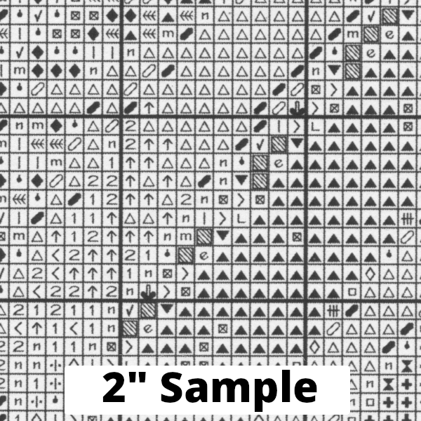 Part of the printed cross stitch chart, showing 2” section of the gridded pattern, with black/white symbols for each stitch.