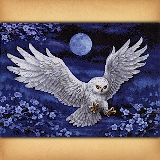 White Owl Cross Stitch Pattern featuring a majestic owl in flight beneath a full moon amid pale blossoms in a deep blue night