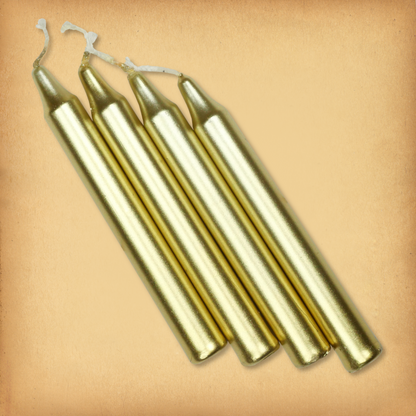 An overhead view of four Metallic Gold Chime Candles, diagonally placed on a plain surface, showing the candles' proportions.