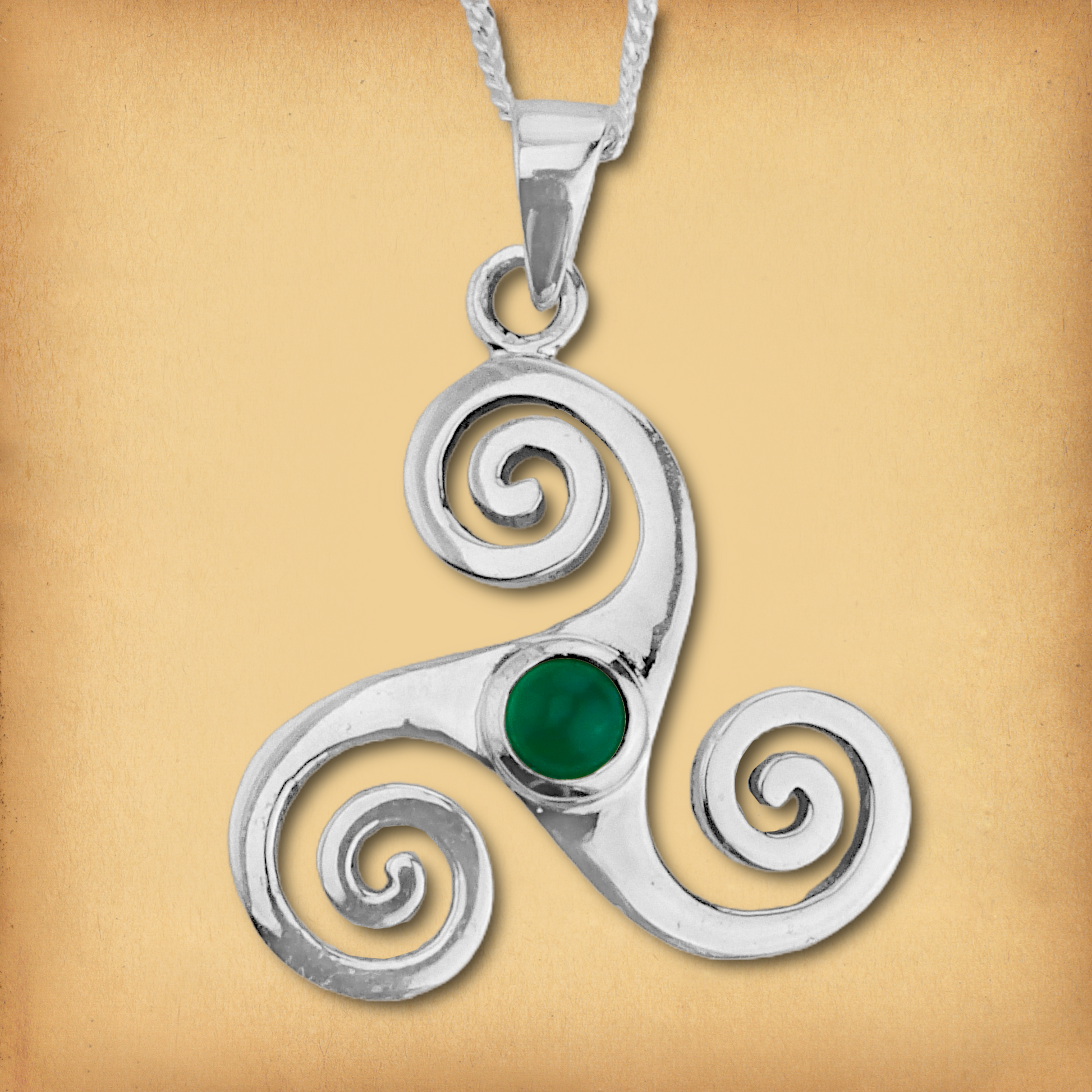 Sterling Silver Triskele Pendant with triple spiral design and green agate stone, inspired by Celtic traditions and symbols.