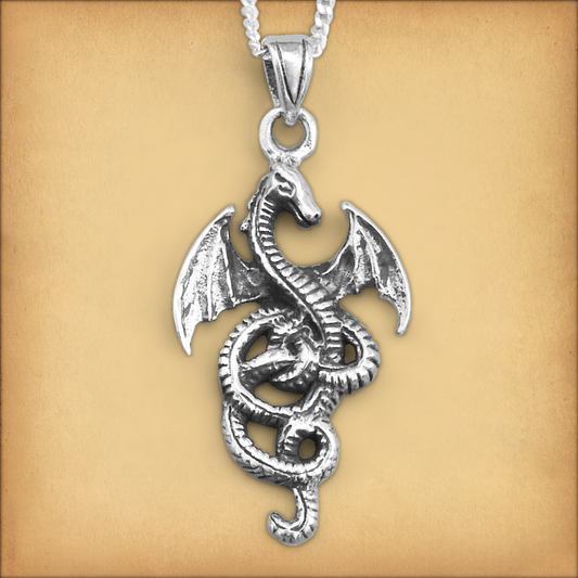 Sterling Silver Coiled Dragon Pendant with wings spread and body in long, sinuous curves. Perfect jewelry for dragon-lovers!