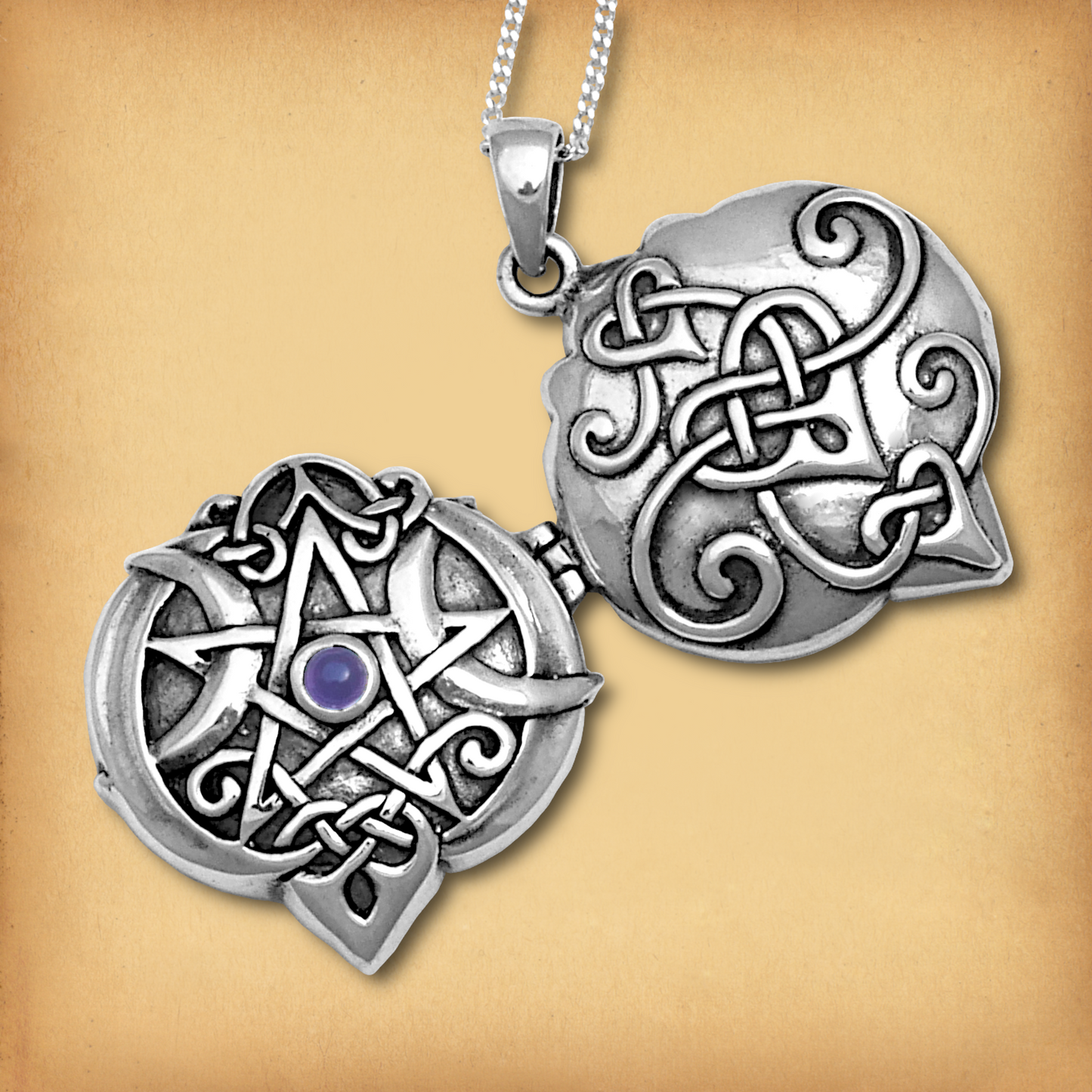 Silver Amethyst Heart Pentacle Locket, shown open to reveal the pentacle, gemstone, and Celtic knotwork on the front and back