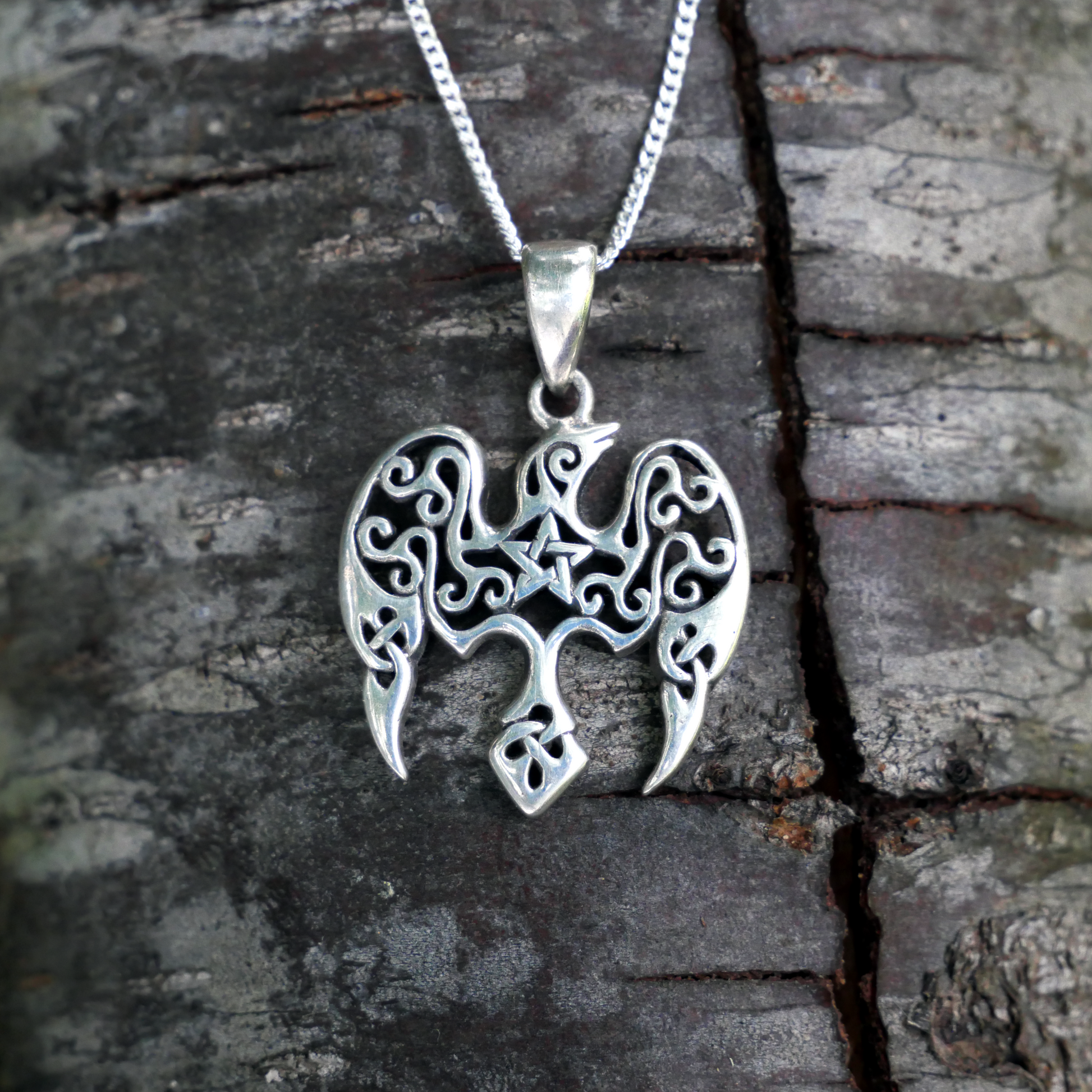 Silver Star Raven Pendant