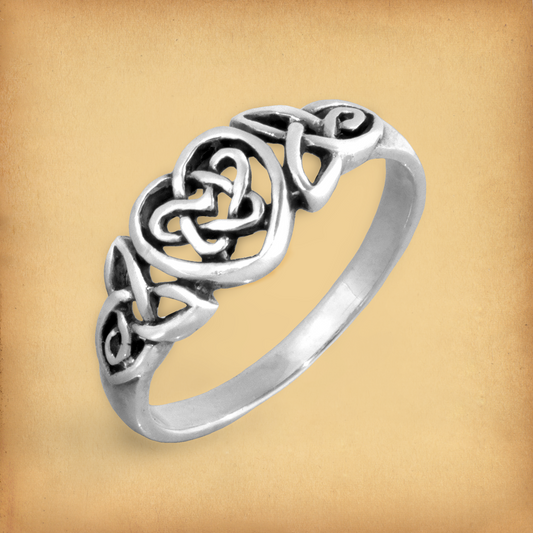 Silver Celtic Heart Ring in sterling silver, featuring Celtic knots forming a timeless heart motif with a star at its center.