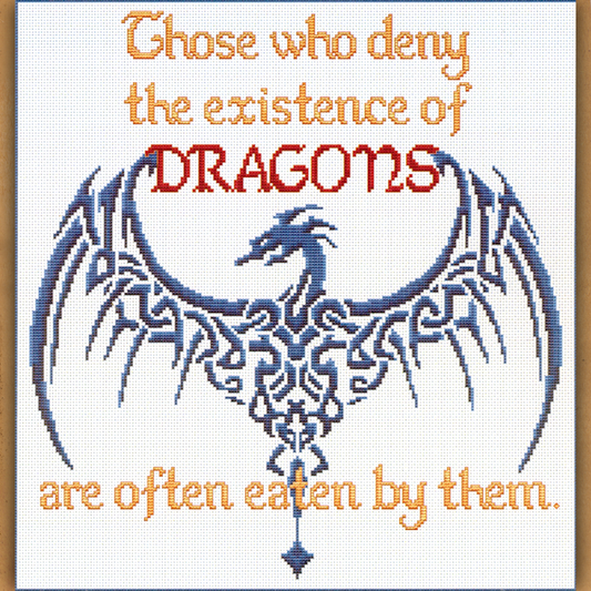 Deny Dragons cross stitch design featuring a Celtic-style dragon with outstretched wings and a funny fantasy-inspired quote.
