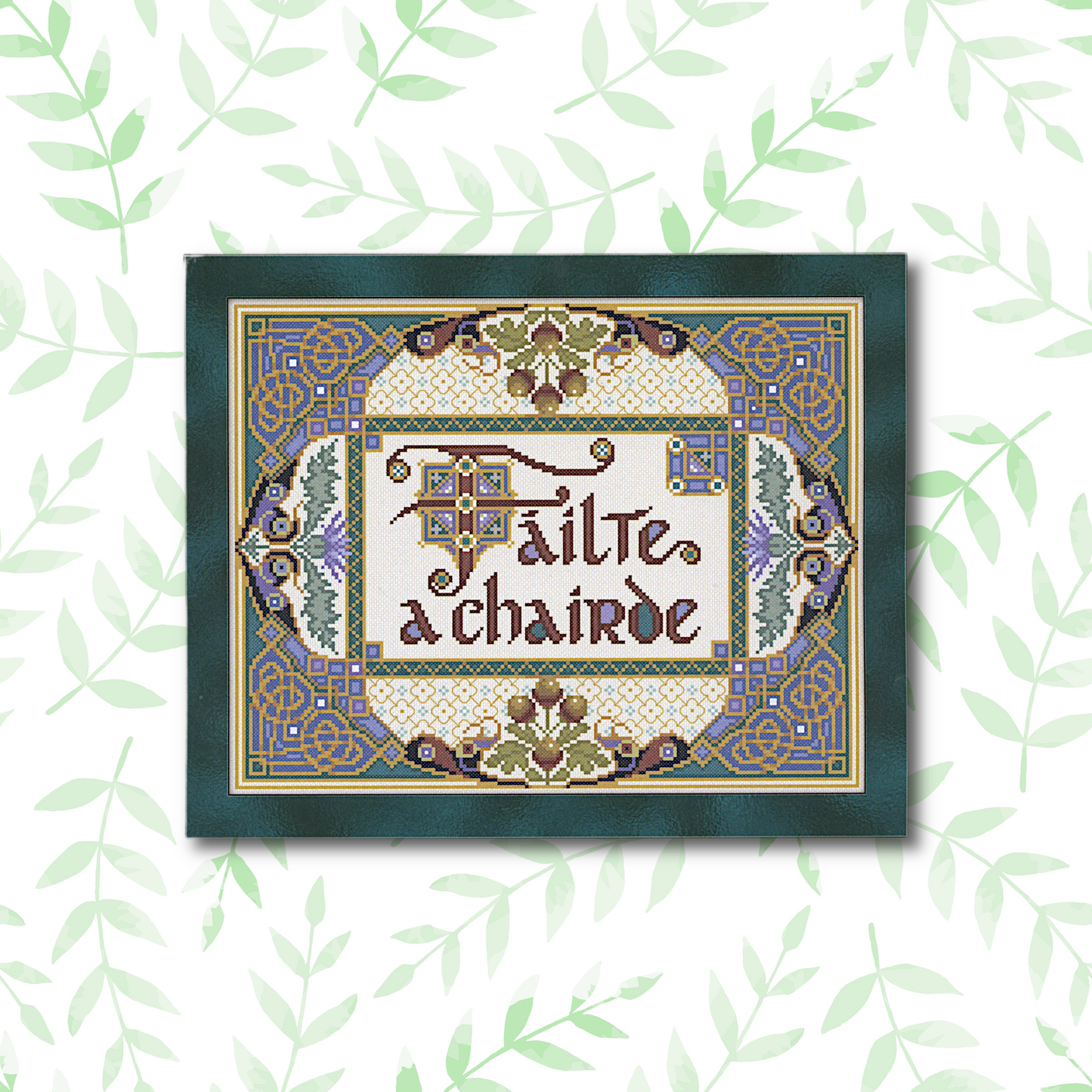 Fáilte a Chairde cross stitch project, fully stitched and displayed in a frame, featuring an intricate Celtic design.
