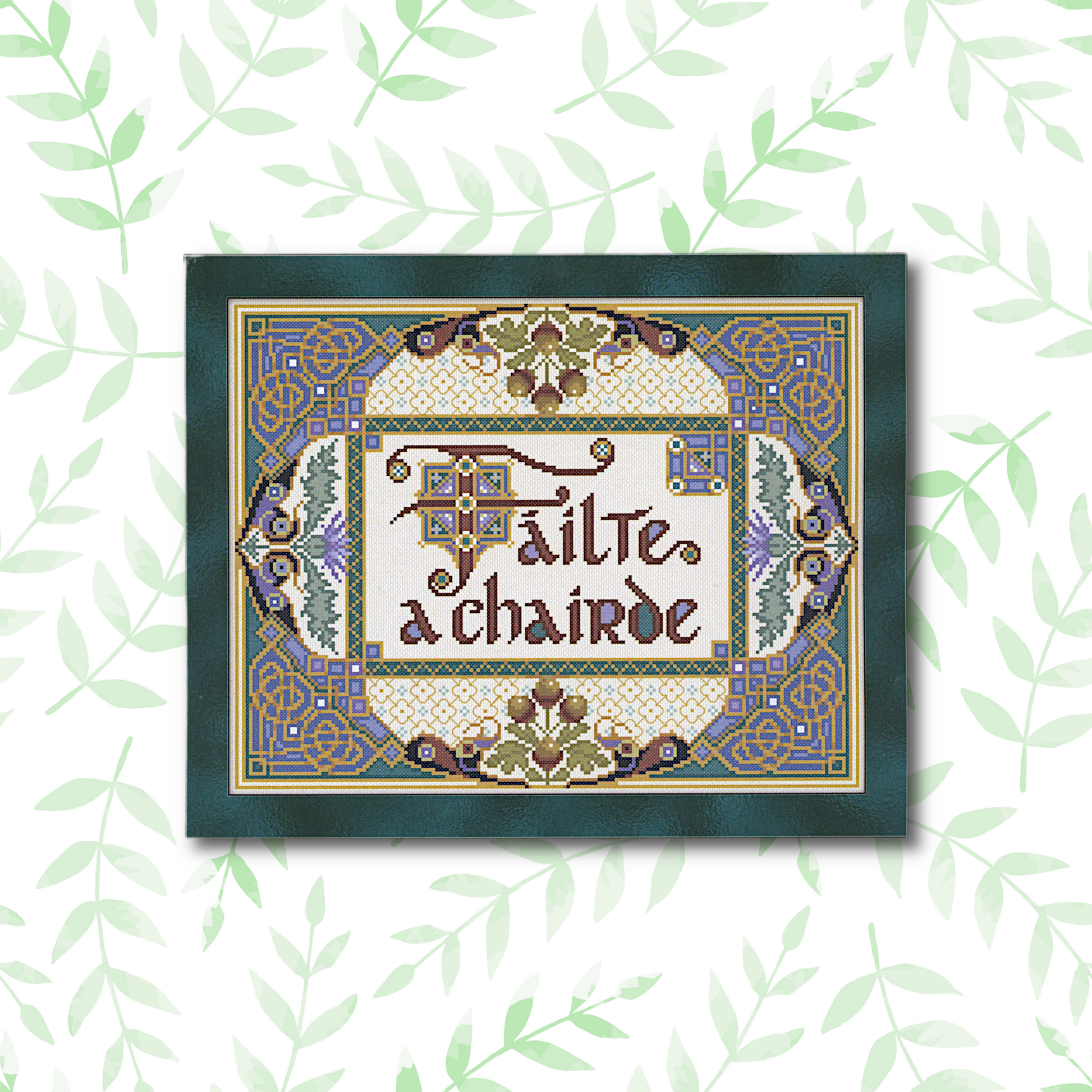Fáilte a Chairde cross stitch project, fully stitched and displayed in a frame, featuring an intricate Celtic design.