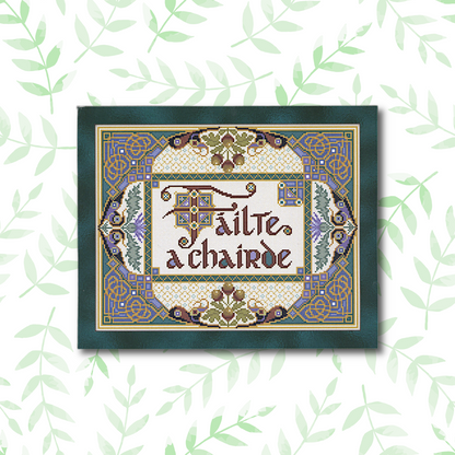 Fáilte a Chairde cross stitch project, fully stitched and displayed in a frame, featuring an intricate Celtic design.