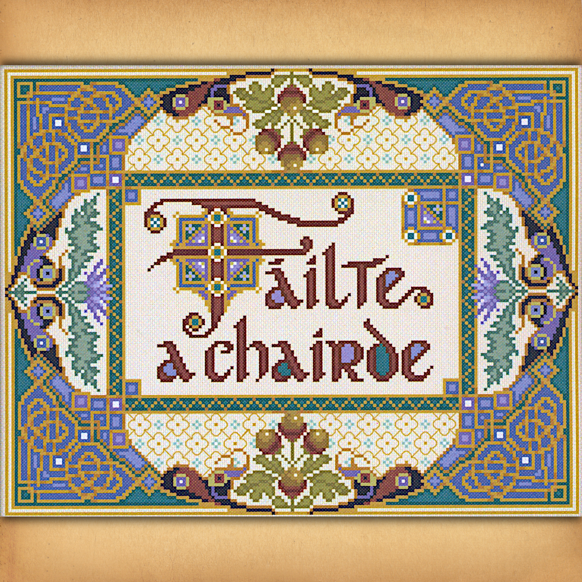 Fáilte a Chairde cross stitch design featuring ornate Celtic-inspired border and Gaelic welcome message in decorative script.