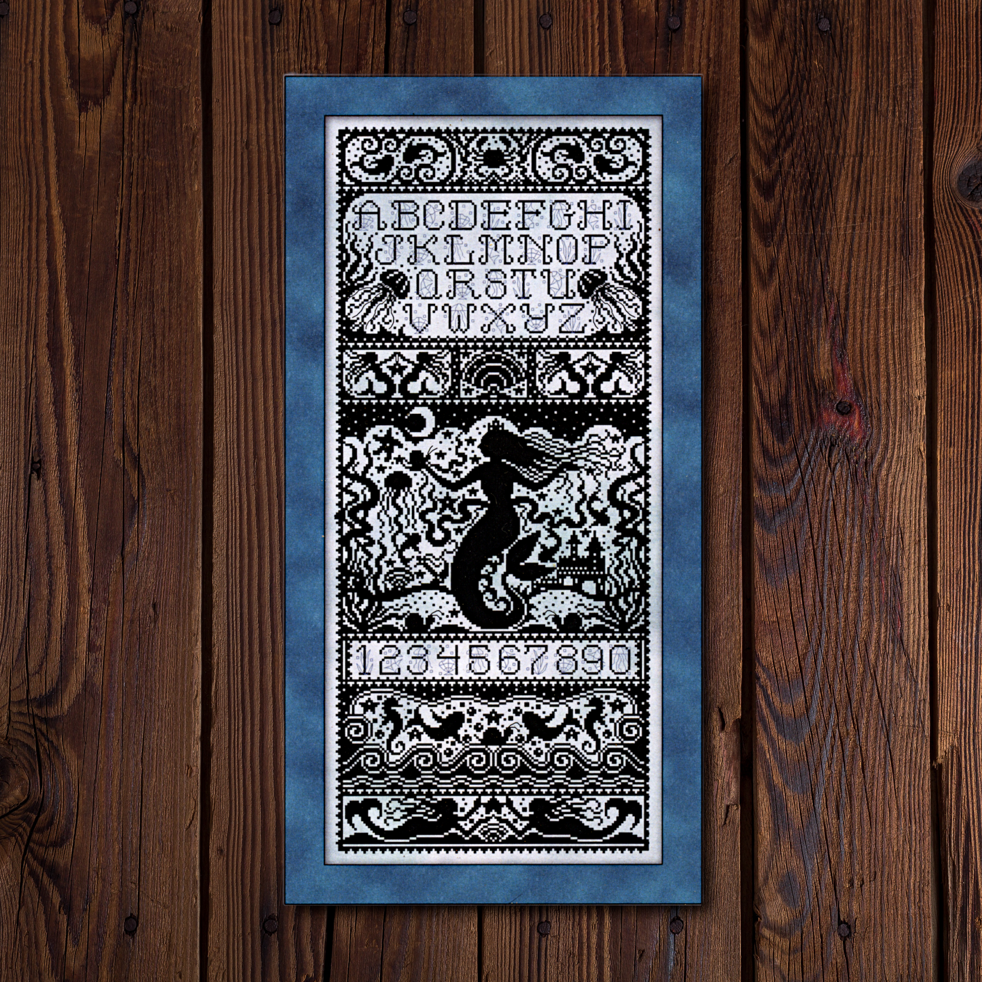 The Mermaid’s Realm Cross Stitch Sampler