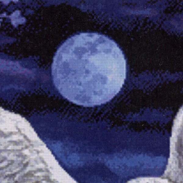 Close-up of the White Owl Cross Stitch Pattern, showing the softly shaded full moon in a deep blue night sky.