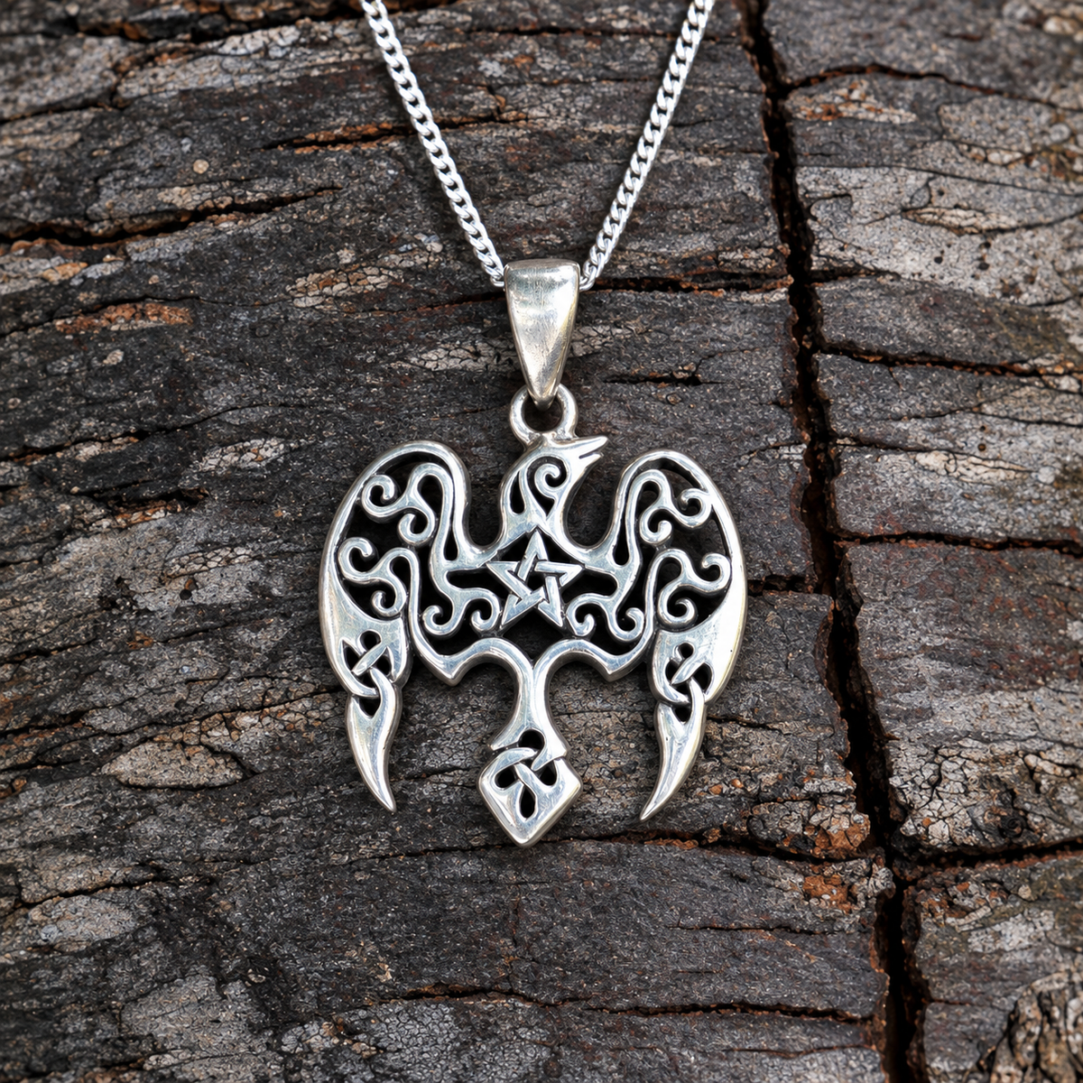 Silver Star Raven Pendant